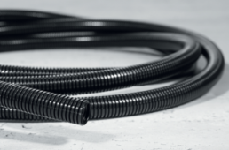 Corrugated hose, inside Ø 8.3 mm, outside Ø 11.5 mm, BR 20 mm, polyamide, black
